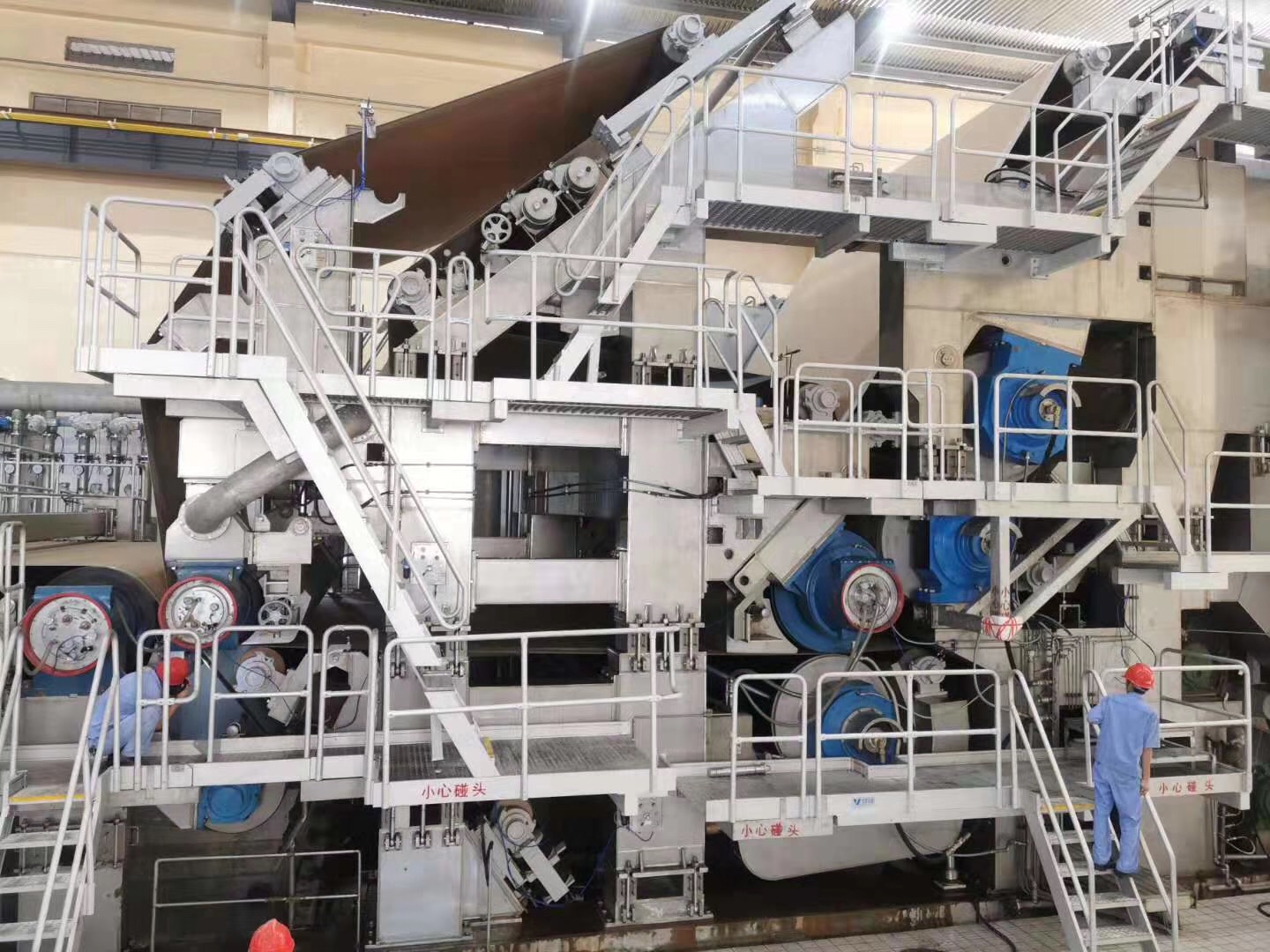 What are the main causes of paper machine malfunctions?